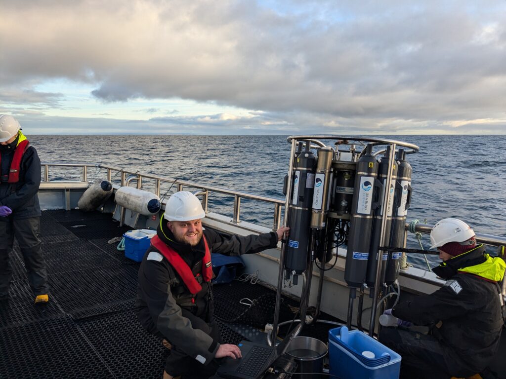 PML’s Marine Robotics Engineer Ross Sanders supporting with rosette water samples onboard the KMS Valonia